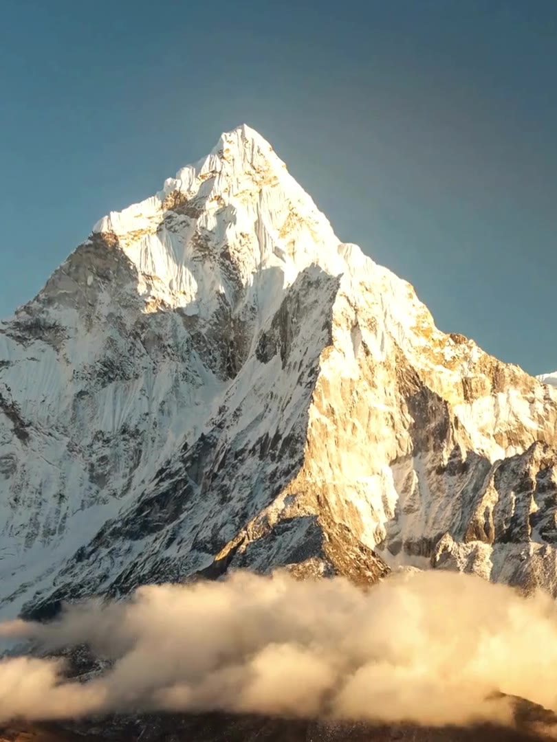 The Himalaya rising above the clouds in Nepal — Reliance Corporate Advisors